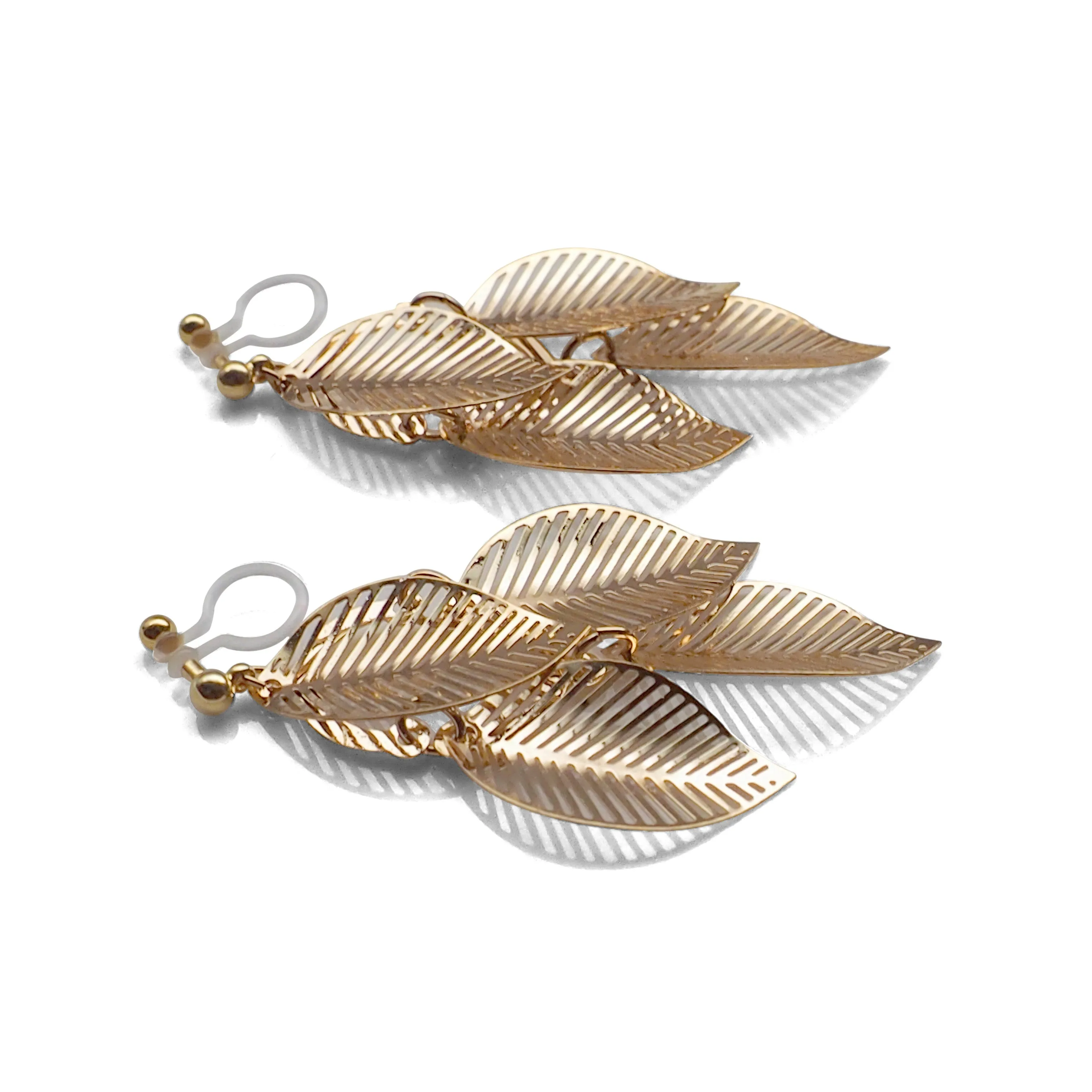 Gold four leaf filigree invisible clip on earrings