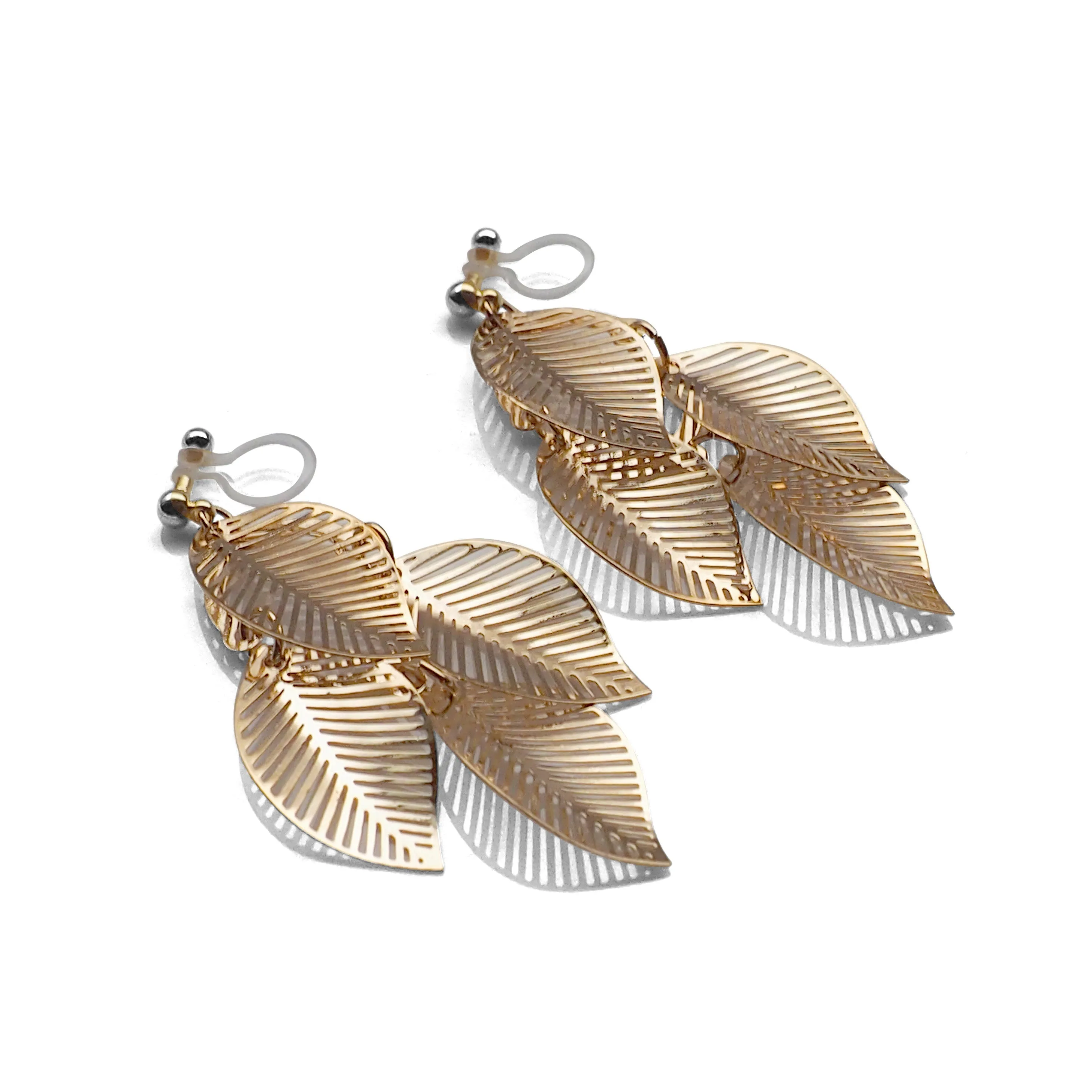 Gold four leaf filigree invisible clip on earrings